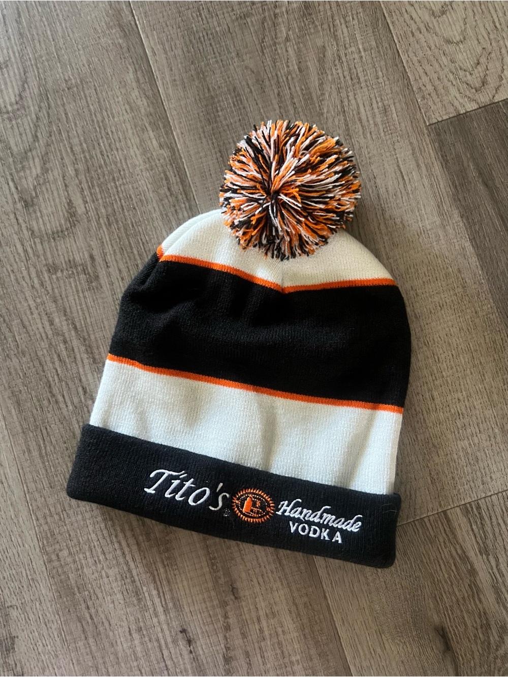 Tito's Handmade Vodka Pom Beanie in Black, White & Orange